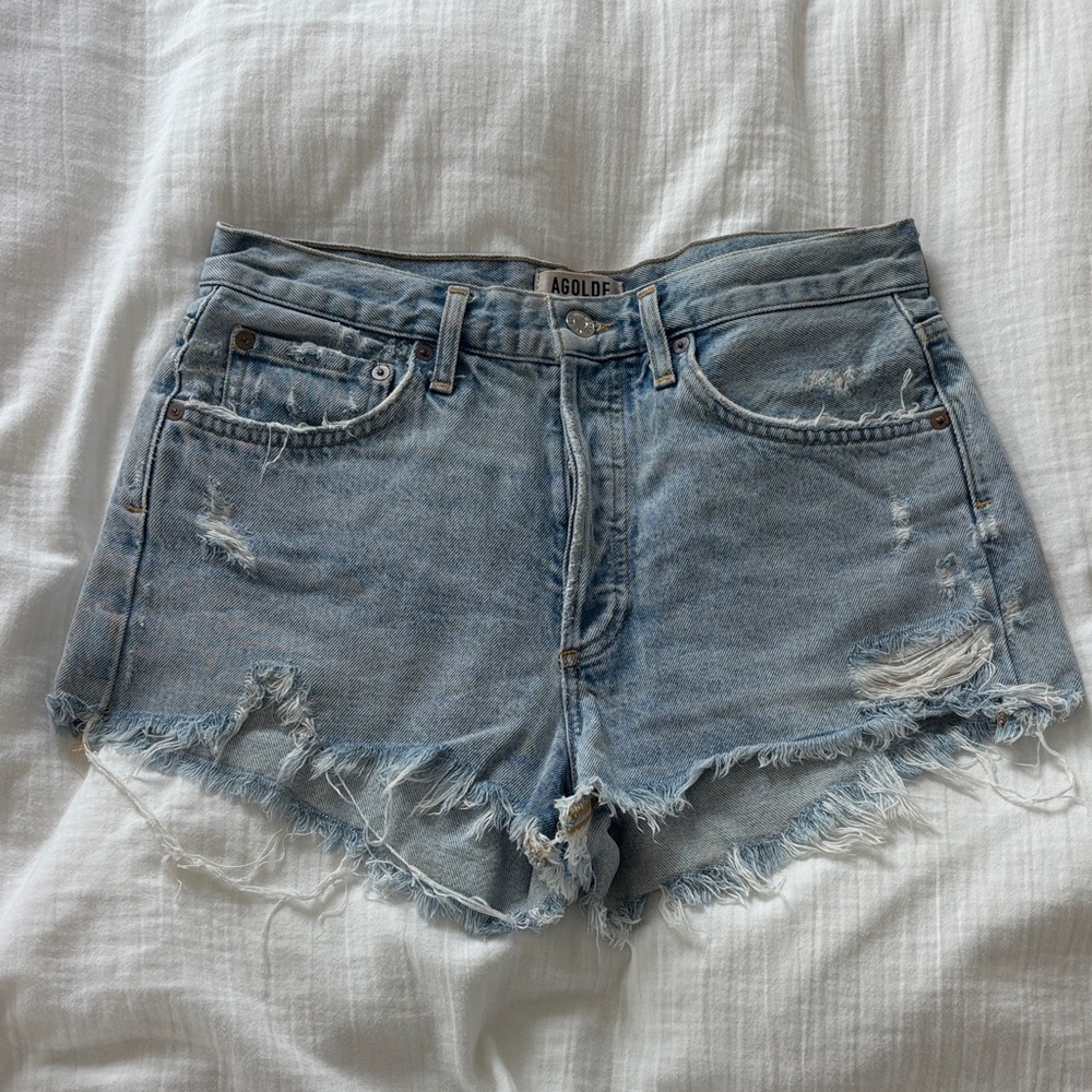 Agolde Faded Light Blue Distressed Denim Shorts